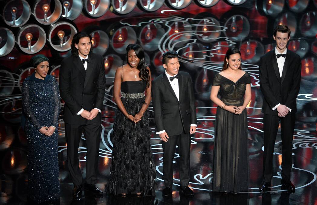 (L-R) Student filmmakers Zaineb Abdul-Nabi, Jean Paul Isaacs, Tayo Amos, Nathan Flanagan-Frankl, Mackenna Millet, and Bryson Kemp speak onstage during the Oscars at the Dolby Theatre on March 2, 2014 in Hollywood Photo: GETTY IMAGES