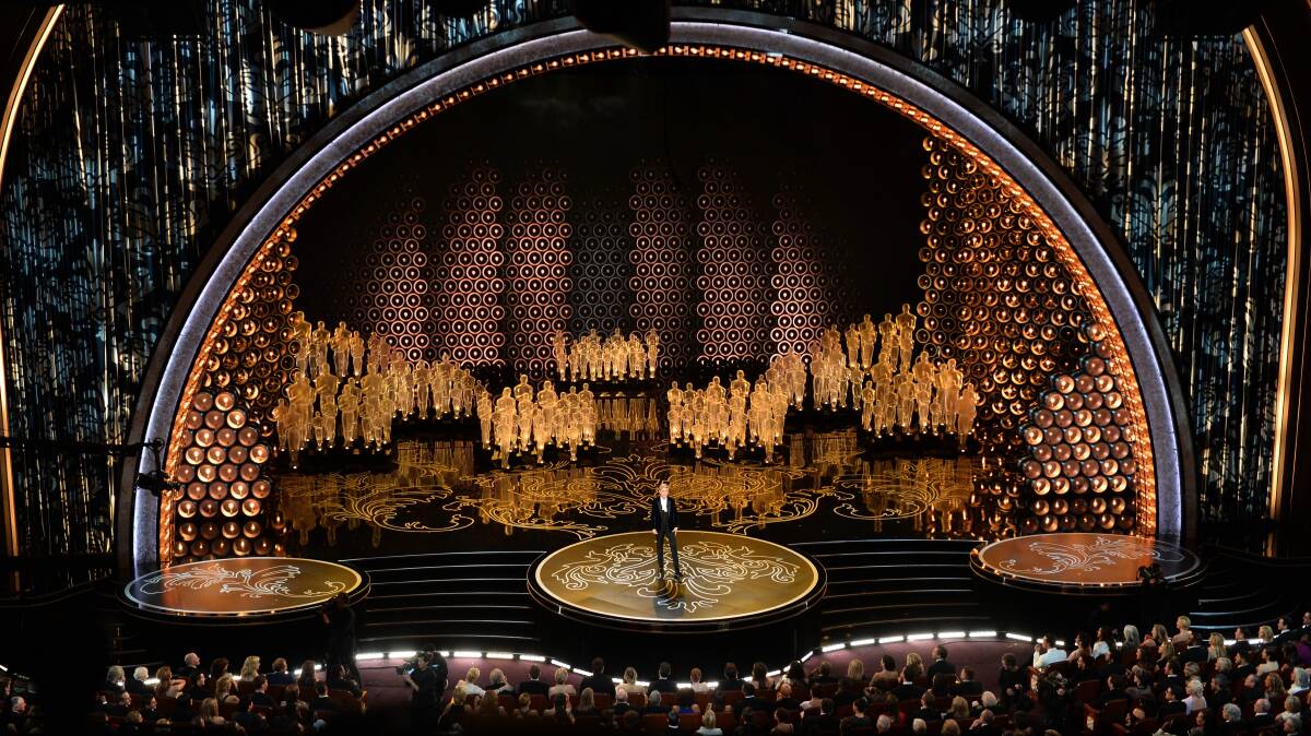 Host Ellen DeGeneres speaks onstage during the Oscars at the Dolby Theatre on March 2, 2014 in Hollywood Photo: GETTY IMAGES
