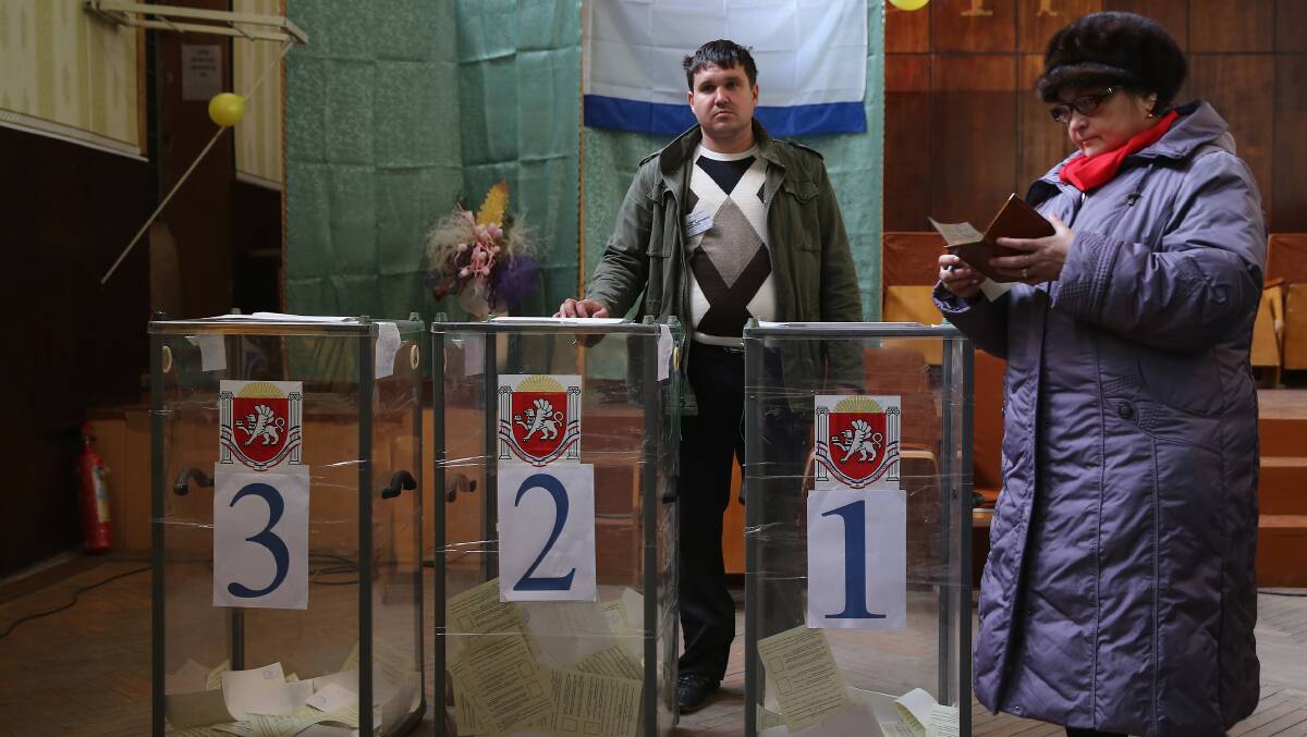 Crimean's went to the polls today in a vote that which will decide whether the peninsular will break away from mainland Ukraine. Photo: GETTY IMAGES