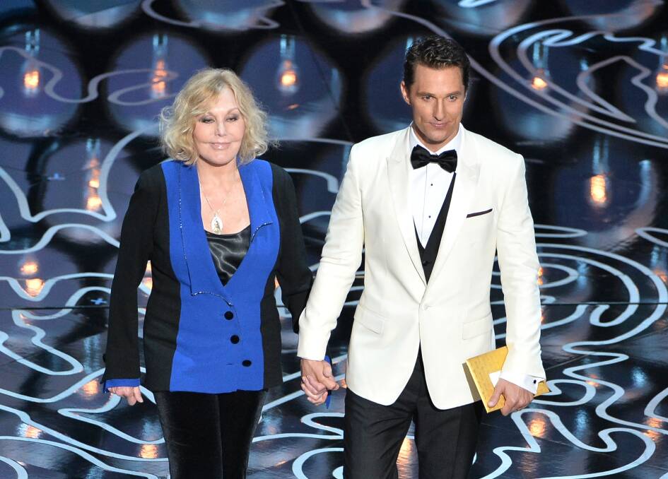 Actors Kim Novak (L) and Matthew McConaughey speak onstage during the Oscars at the Dolby Theatre on March 2, 2014 in Hollywood Photo: GETTY IMAGES