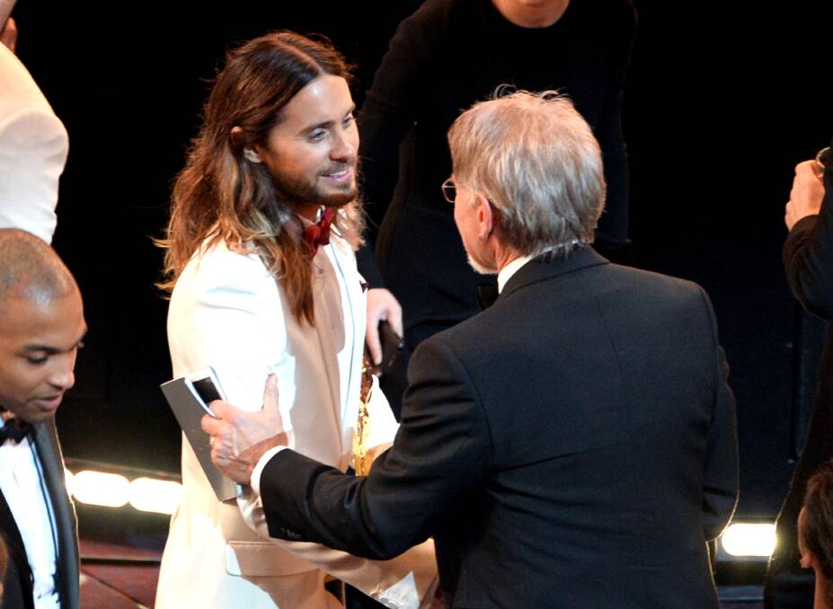 Actor Jared Leto (L), winner of the Best Performance by an Actor in a Supporting Role award for 'Dallas Buyers Club,' and actor Harrison Ford (R) in the audience during the Oscars at the Dolby Theatre on March 2, 2014 in Hollywood Photo: GETTY IMAGES