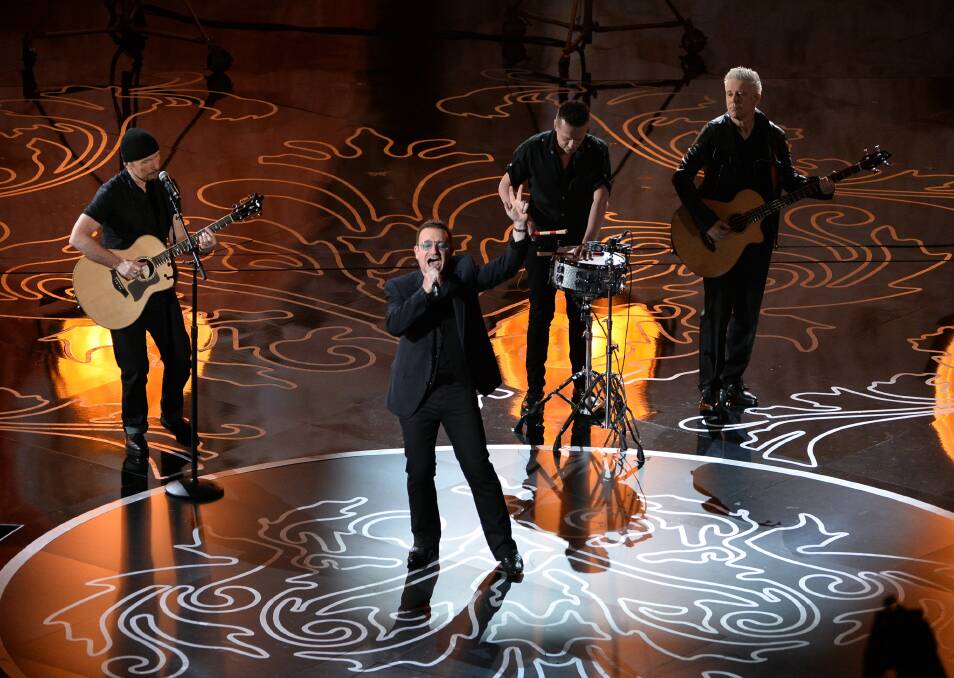 (L-R) Musicians The Edge, Bono, Larry Mullen Jr., and Adam Clayton of U2 perform onstage during the Oscars at the Dolby Theatre on March 2, 2014 in Hollywood Photo: GETTY IMAGES