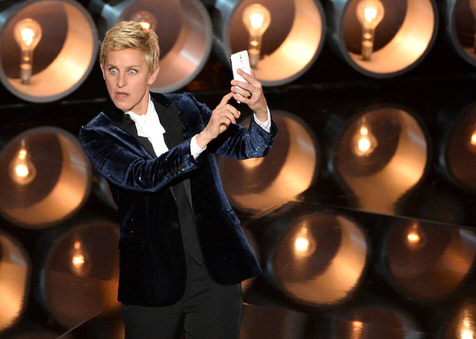 Host Ellen DeGeneres speaks onstage during the Oscars at the Dolby Theatre on March 2, 2014 in Hollywood Photo: GETTY IMAGES