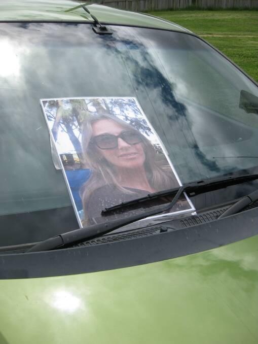 Sylvia's friend Rachael Bush, of Eden, put a 
missing poster on her car outside the court house after being denied permission to hang it inside the court.