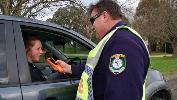 L-plate driver Aimee Badewitz is tested by Senior Constable Mick Campbell.