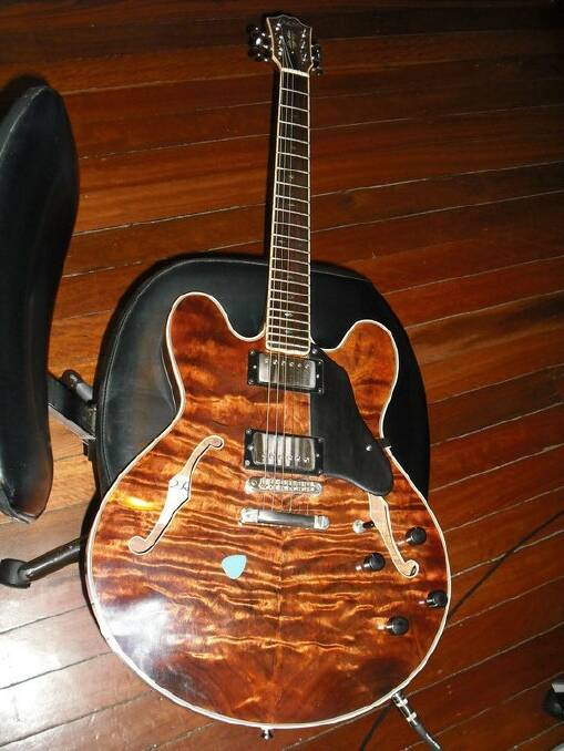 The missing replica Gibson 335 guitar.