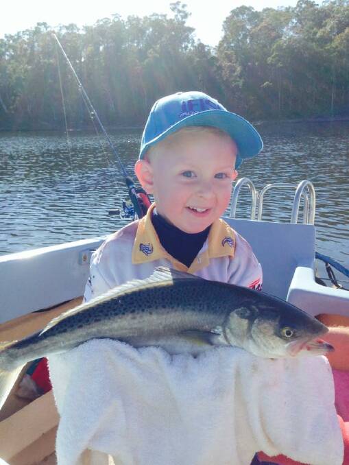 Catch of the Day (Sept. 12, 2014): Here we have Jacob Prime, who gave his dad a lesson in fishing for Father's Day, catching this 54cm salmon in Mogereeka Inlet at Tathra. 