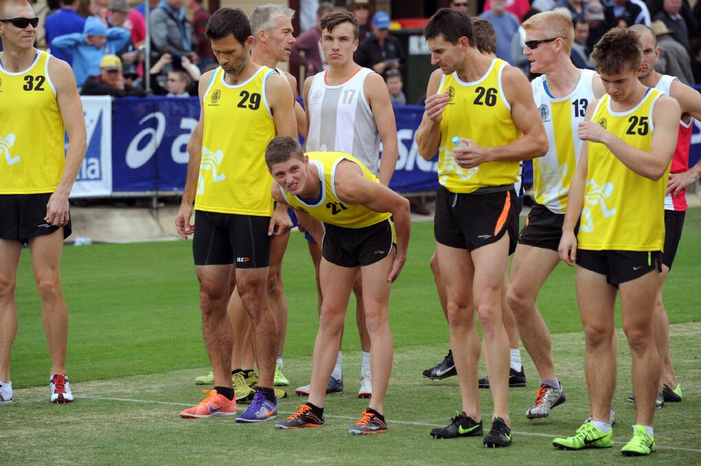 Stawell's Ashley Cowan, no27, before the backmarker's handicap 1600m at the 2014 Stawell Gift. 