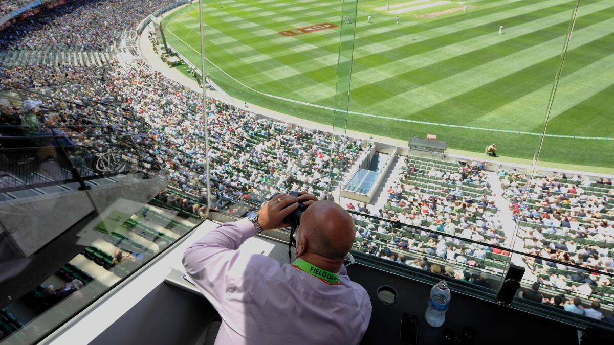 Security keep a close eye on cricket fans at last year's Boxing Day test.