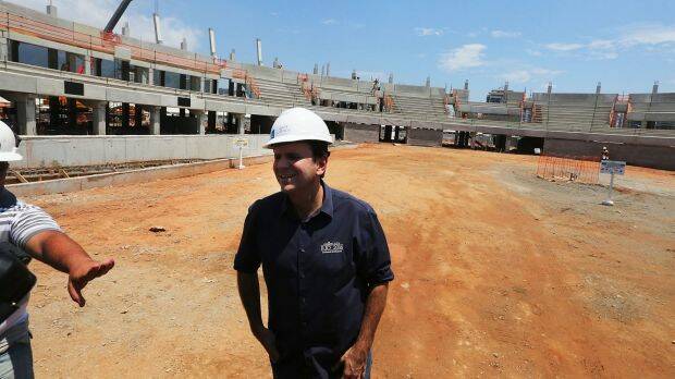 Rio Mayor Eduardo Paes inspects construction work at the Olympic Park's Tennis Centre in December.. Photo: Getty Images