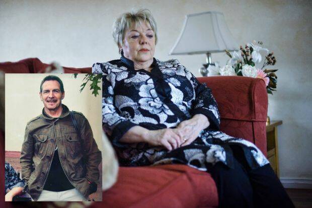 Margaret Daly and a photograph of her husband, John, who died two years after he went into aged care. Photo: Joe Armao