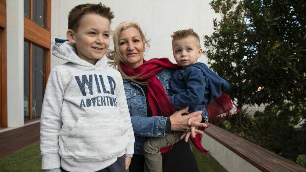 Nikola Barac, 6, with his mother Fiona Stamenkovic and brother Milan outside Westmead Institute for Medical Research.  Photo: Jessica Hromas
