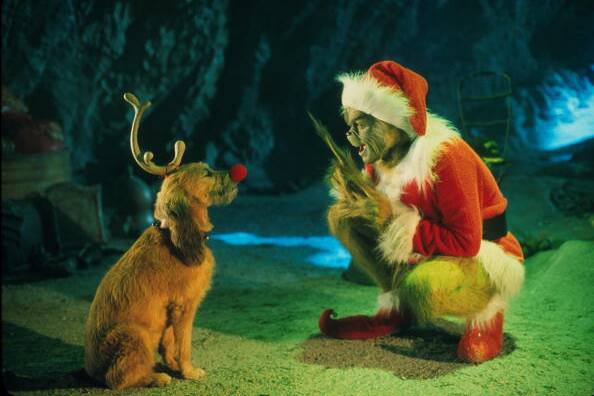 Jim Carrey as Dr Suess' Grinch and his red nosed dog. Getty images