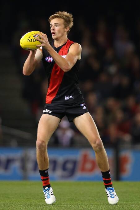 Martin Gleeson of the Bombers marks during the round five AFL match between the Essendon Bombers and the St Kilda Saints at Etihad Stadium on April 19, 2014 in Melbourne, Australia. Photo: Quinn Rooney/Getty Images.