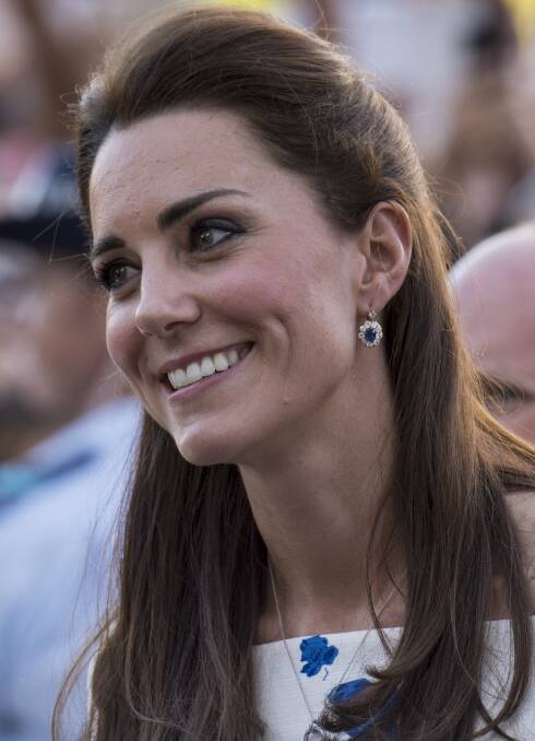 Catherine, Duchess of Cambridge meets well wishers during a walkabout on April 19, 2014 in Brisbane, Australia. The Duke and Duchess of Cambridge are on a three-week tour of Australia and New Zeal on April 19, 2014 in Brisbane, Australia. Photo: Arthur Edwards - Pool/Getty Images.