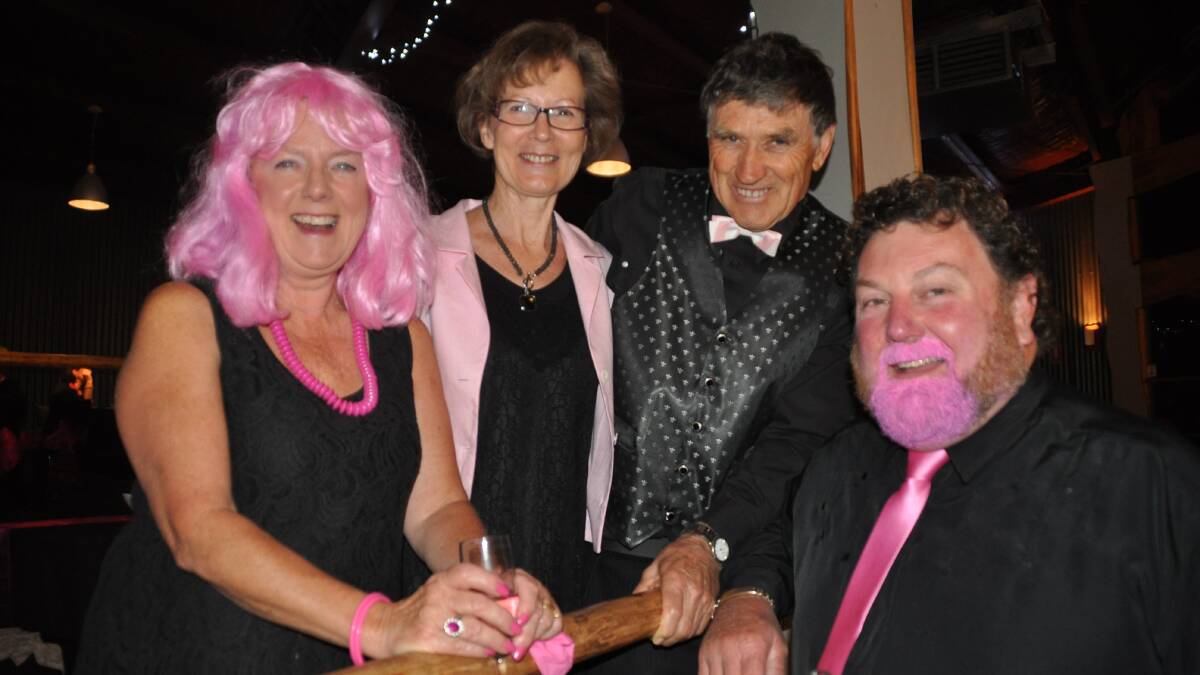 PAMBULA: Diane and Ron Martin were flanked by the very pink Whitbys, Robyn and Greg at the Pink and Black cocktail party fundraiser for Bega Oncology held at Oaklands Pambula.  