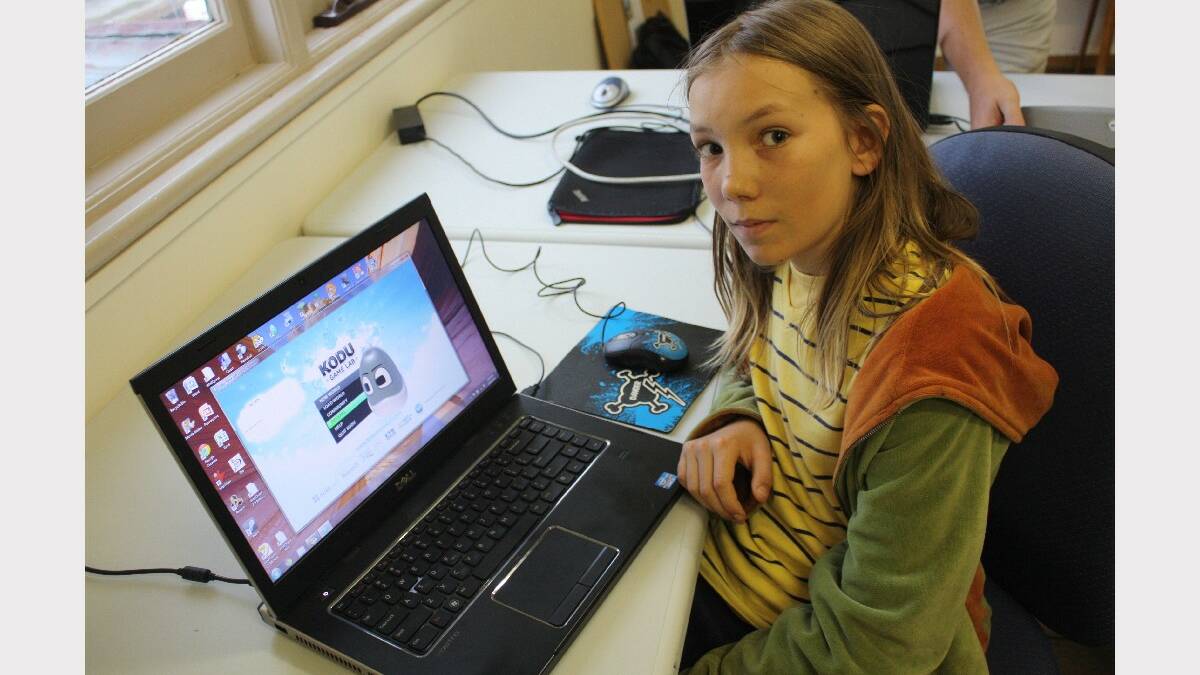 BEGA: Twelve-year-old Aurin Yang gives a demonstration on how to program 3D computer games at a CoWS Near the Coast IT workshop.