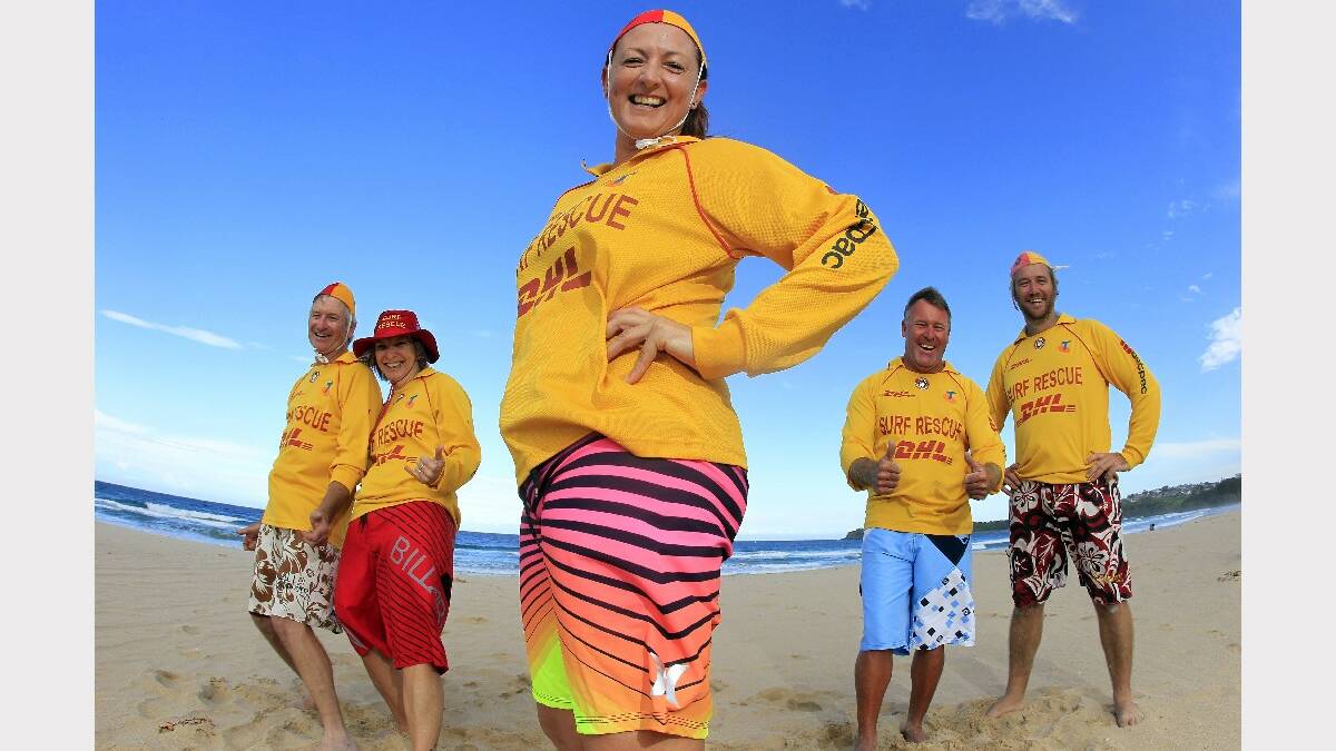 KIAMA: Kiama Downs SLSC members wear bright board short to help raise awareness and money for their club. L-R Ken Horspool, Jan Horspool, Lynley Coles, Bob Sinclair and Josh Douglas on Jones Beach.  