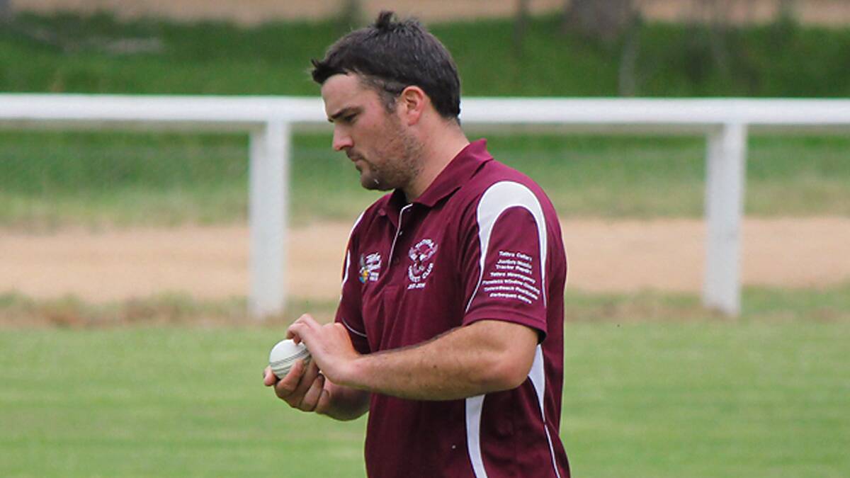 TATHRA: Adam Blacka polishes the ball on his way to claiming five wickets against the Merimbula Knights on Saturday. 