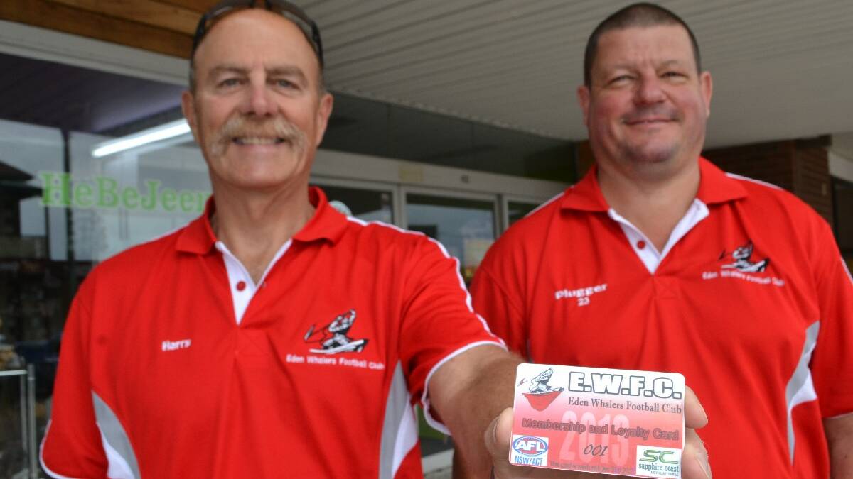EDEN: Eden Whalers (AFL) club stalwarts Harry Weatherman and Paul Kirkby with the AFL clubs loyalty discount card, which was launched at late night shopping this week.
 