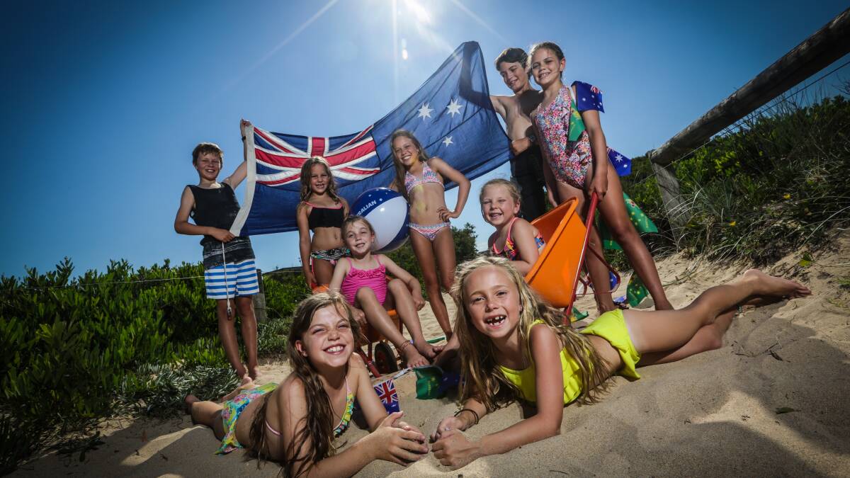 KIAMA: Kiama Downs Surf Lifesaving Club youngsters Jesse Brooks (back left), Gabi Deen, Ella Clark, Ethan Clark, Lily Clark, Charlie Brooks (centre), Macey Guy, Zoe Brooks (front left) and Zali Guy get in the spirit for Australia Day. Picture DYLAN ROBINSON 