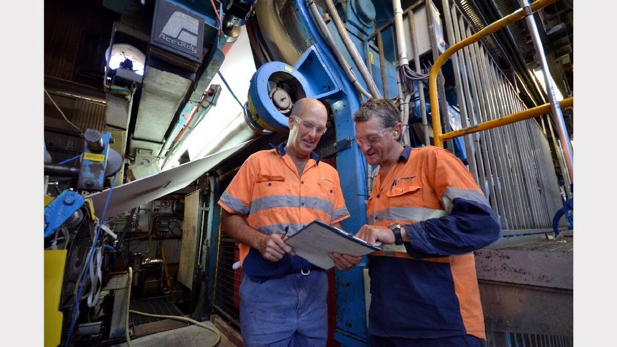 
NOWRA: Australian Paper mill Drier operator Ken Bradley and machine assistant Adam Whitaker are hopeful Australian-made paper will receive support from federal MPs. 
