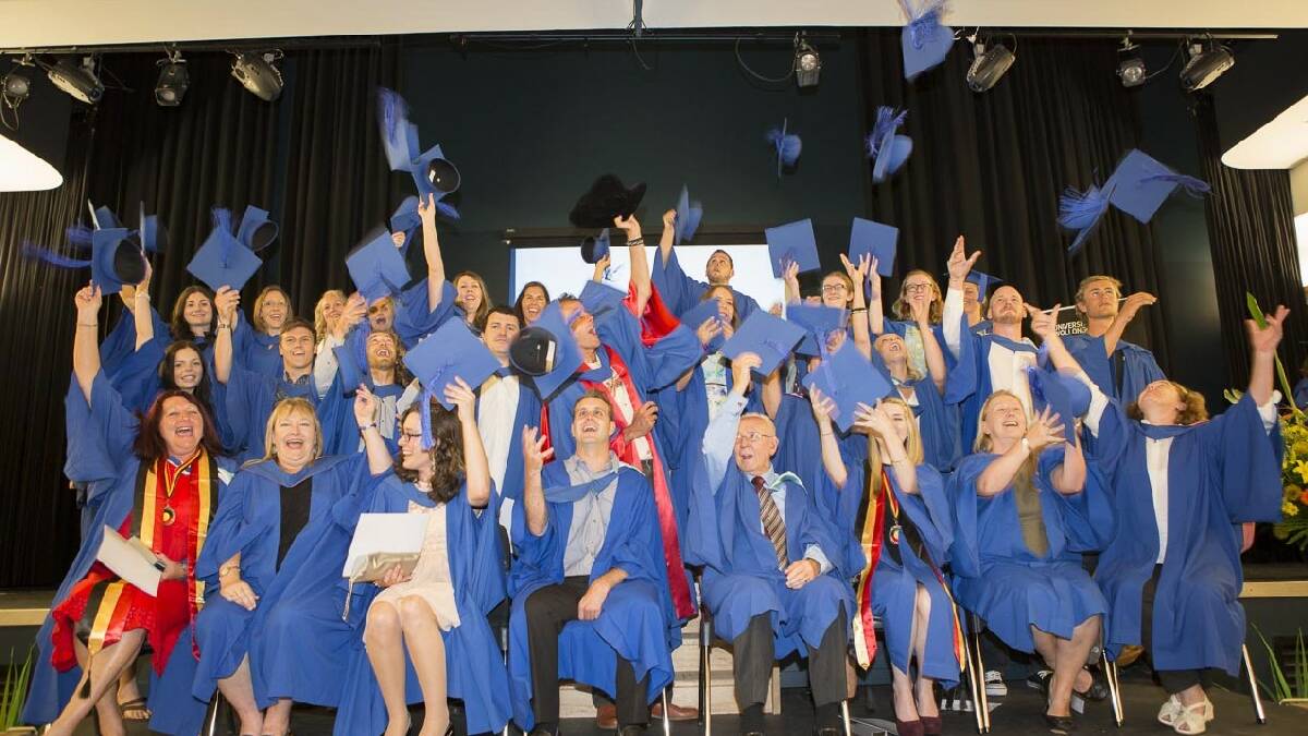 BATEMANS BAY: The largest-ever group of students graduated on Tuesday in Batemans Bay from the University of Wollongong, including the first to gain a PhD from the regional campus. Photo: Mark Newsham. 