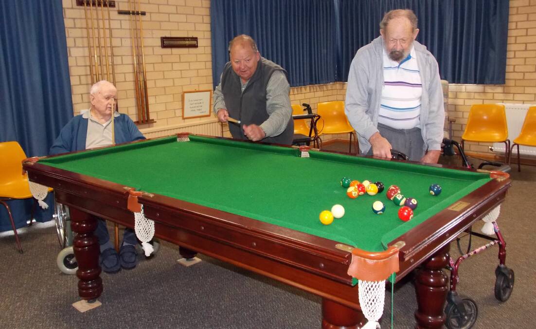 Cecil Summerill, Kevin Turnbull and John Cameron shot some pool during the social get together. 
