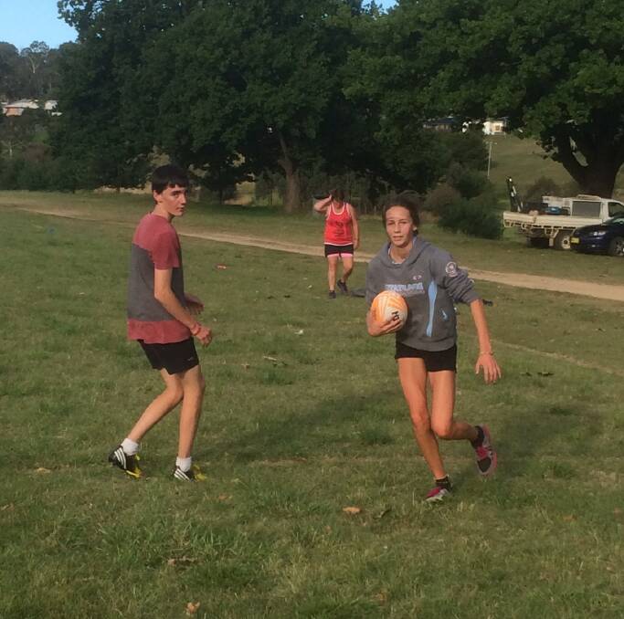 
Alex Rosten and Molly Badewitz play in the social games on Friday night.