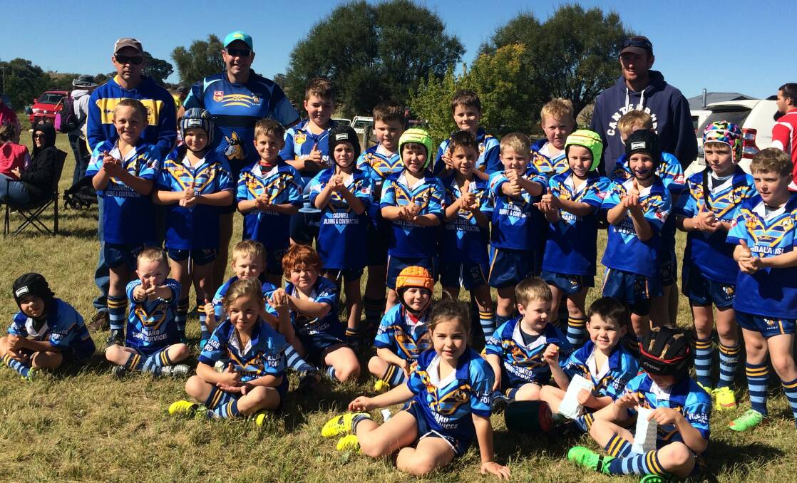 Enjoying the 50th anniversary Junior Football Carnival in Bibbenluke on Saturday were coaches, Gary Brownlie, Rolly Skellern and Jarrath Hillyer with the Bombala Blue Heelers Under 7s, 8s and 10s. They were among the 68 teams competing in the milestone event. 