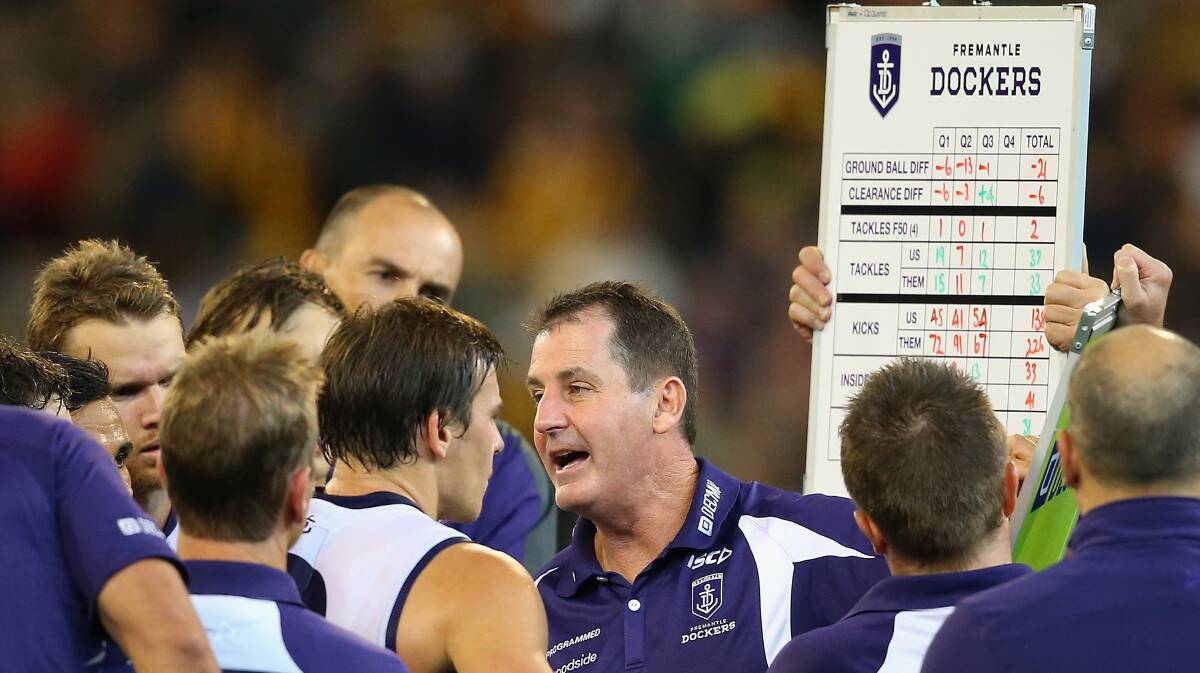 Dockers coach Ross Lyon talks to his players. The Hawks defeated the visiting Dockers 137-79. Picture: Getty Images
