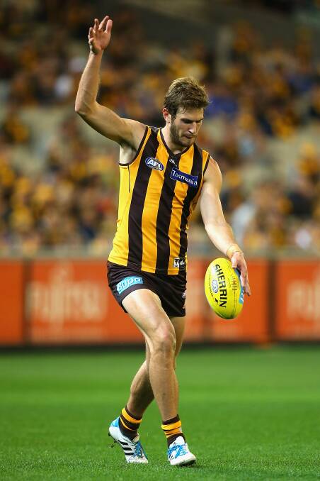 Grant Birchall of the Hawks kicks. The Hawks defeated the visiting Dockers 137-79. Picture: Getty Images