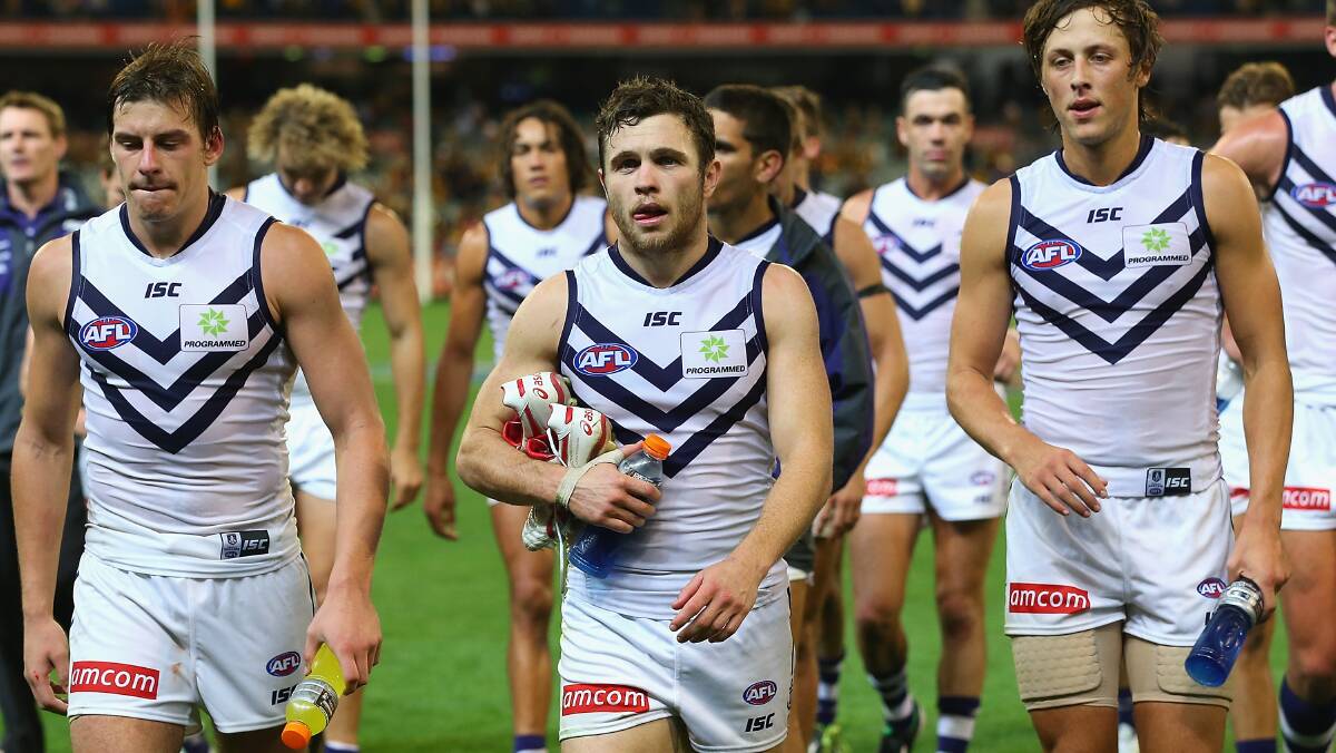 The Dockers look dejected as leave the field after losing. The Hawks defeated the visiting Dockers 137-79. Picture: Getty Images