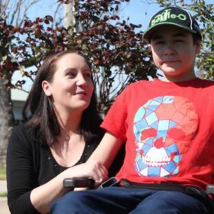 Leza Mcburnie and her son Kaleb are trying to raise money for an electric wheelchair accessible van to get around.