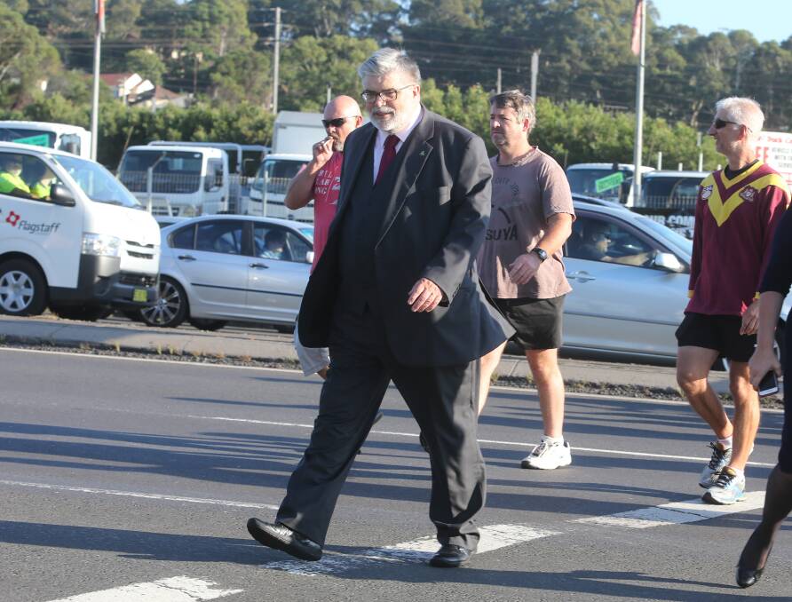 Senator Kim Carr arrives at a public rally outside the Port Kembla steelworks on April 1, ahead of the Senate steel inquiry's visit to the city. Picture: Robert Peet