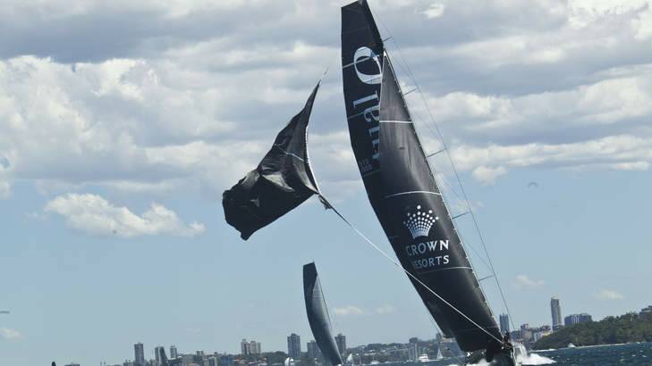 Pivotal moment: Investec Loyal's sail tears during the SOLAS Big Boat Challenge on Tuesday. Photo: Nic Walker