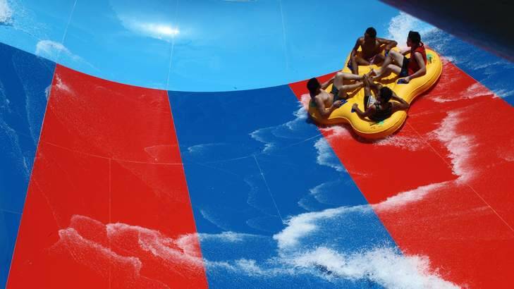 Kids enjoy the ride on the opening day of the new Wet'n'Wild waterpark at Prospect. Photo: Ben Rushton