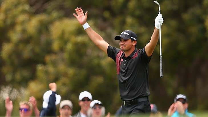 A reason to smile ... Jason Day after his stunning eagle on the 6th. Photo: Getty Images
