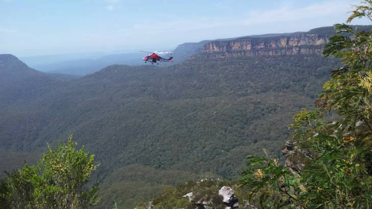 A helicopter surveys the scene after the accident. Photo: Channel Nine