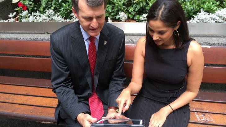 Lord Mayor Graham Quirk and Molly Taylor try out Brisbane's free Wi-Fi. Photo: Supplied