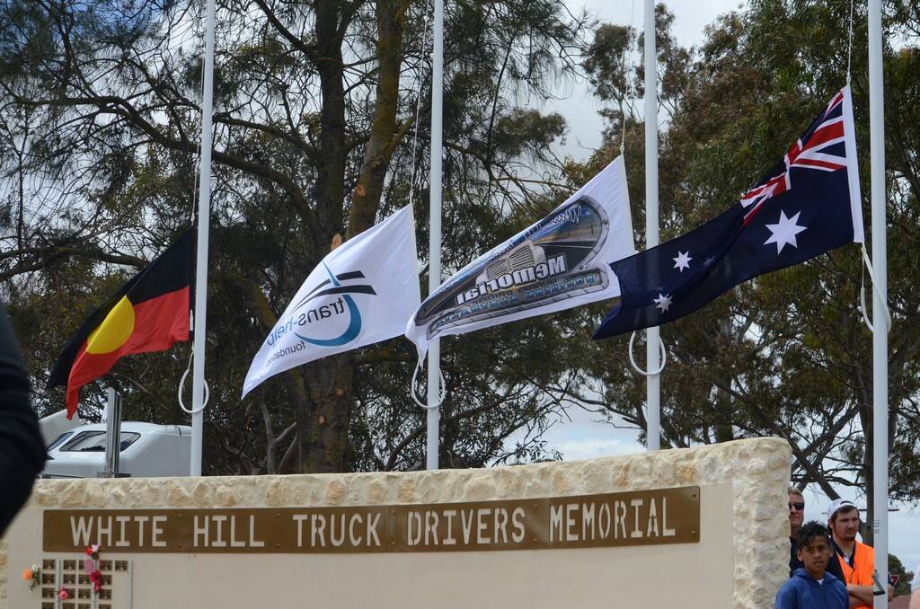 Flags fly at half mast in Murray Bridge on Saturday in memory of truck drivers across the Murray and Mallee who have died on the job.