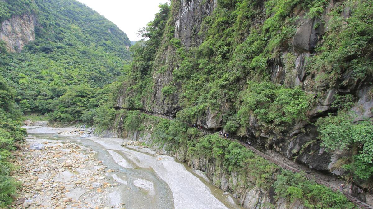 TAROKO GORGE: A section of the original route cut into the cliff is now a popular walking track. Picture: Eddie O'Reilly