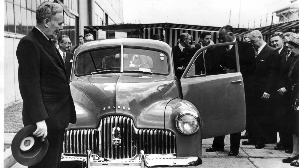 BIRTH OF A LEGEND: 1948, and Prime Minister Ben Chifley inspects Australia's home-built car, the Holden 48-215, also known among fans as the FX. 