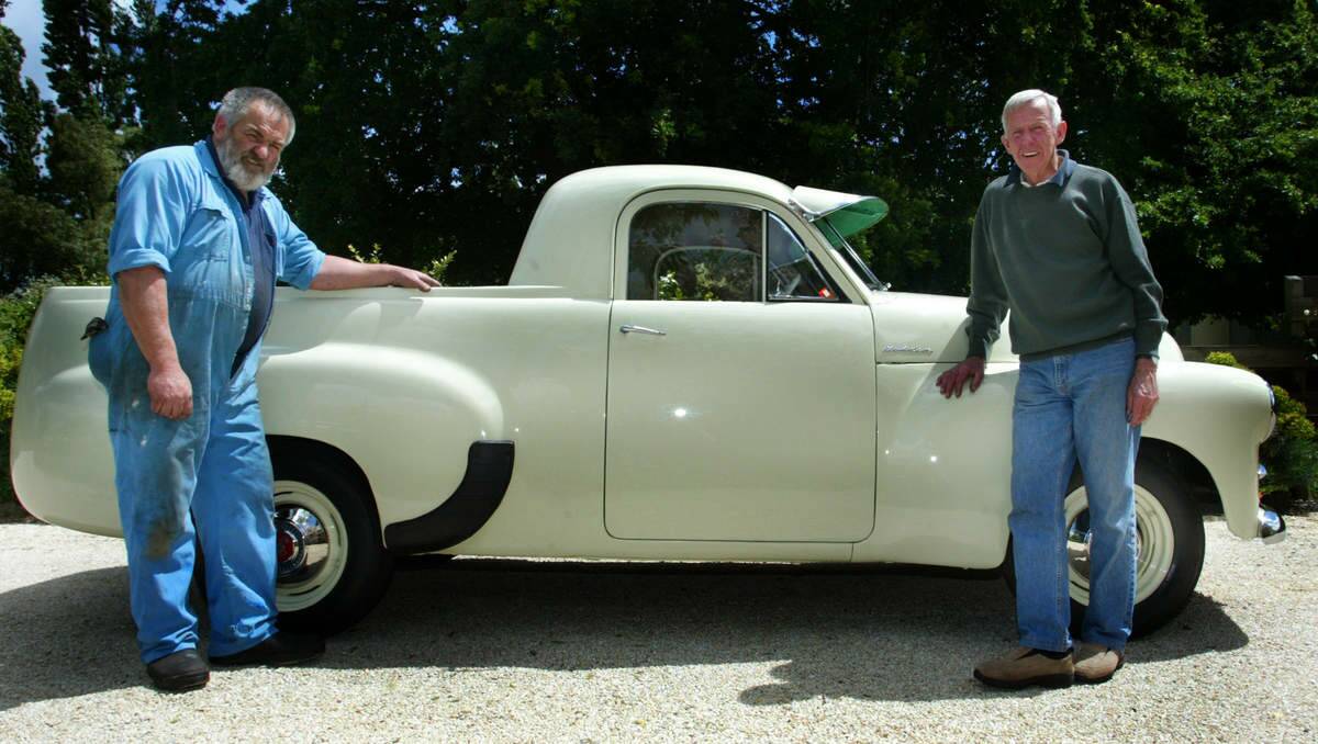 Ian Blackburn of Terang in western Victoria, right, with his FJ ute, restored with the assistance of Doc Elliot, left..