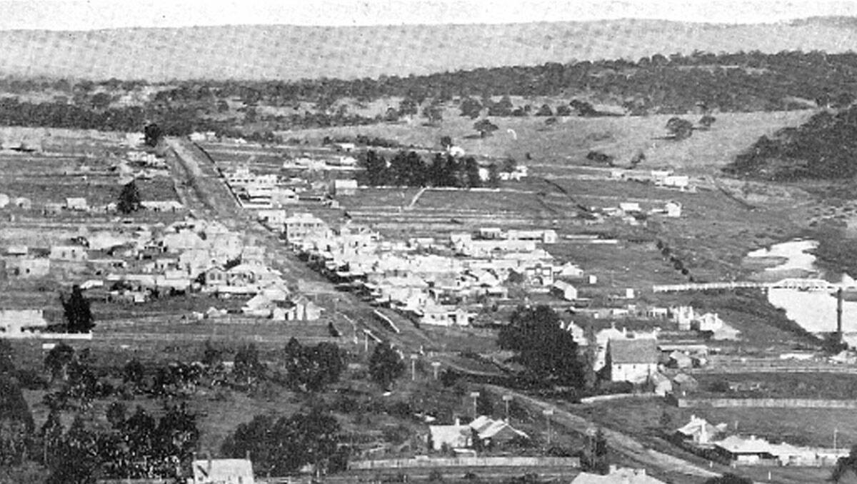 An early photo of the township looking down Maybe St. 