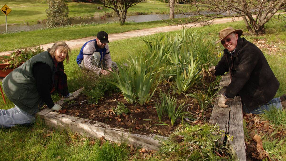 Carol Garnock, Shane Hennessy and Murray Garnock focused on garden beds.