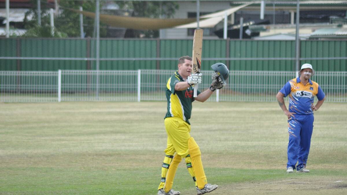 NOWRA: Simon Schmotz responds to the applause of his Ex-Servos team mates after bringing up his century on Saturday. Photo: PATRICK FAHY