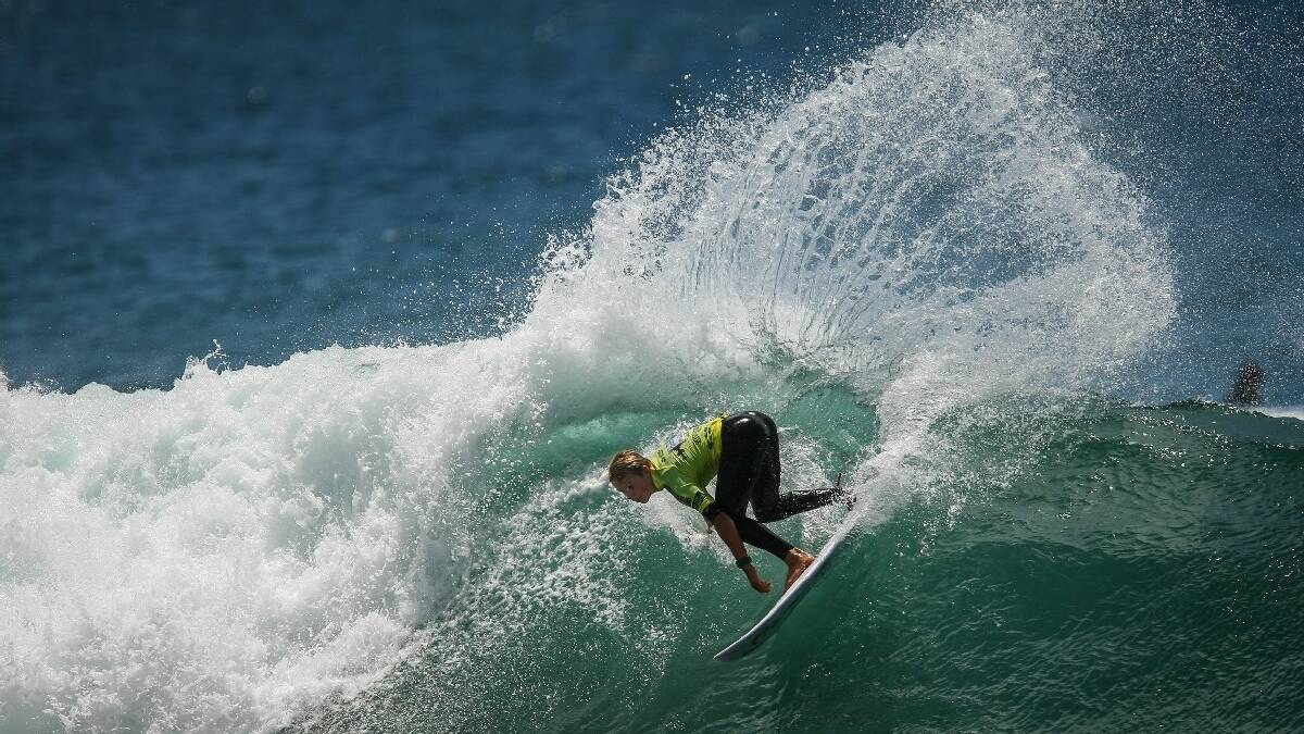 WERRI BEACH: Winner of last week's Australian   Junior Under-18 surfing title Fraser   Dovell shows his style in the final at   Werri Beach last weekend.