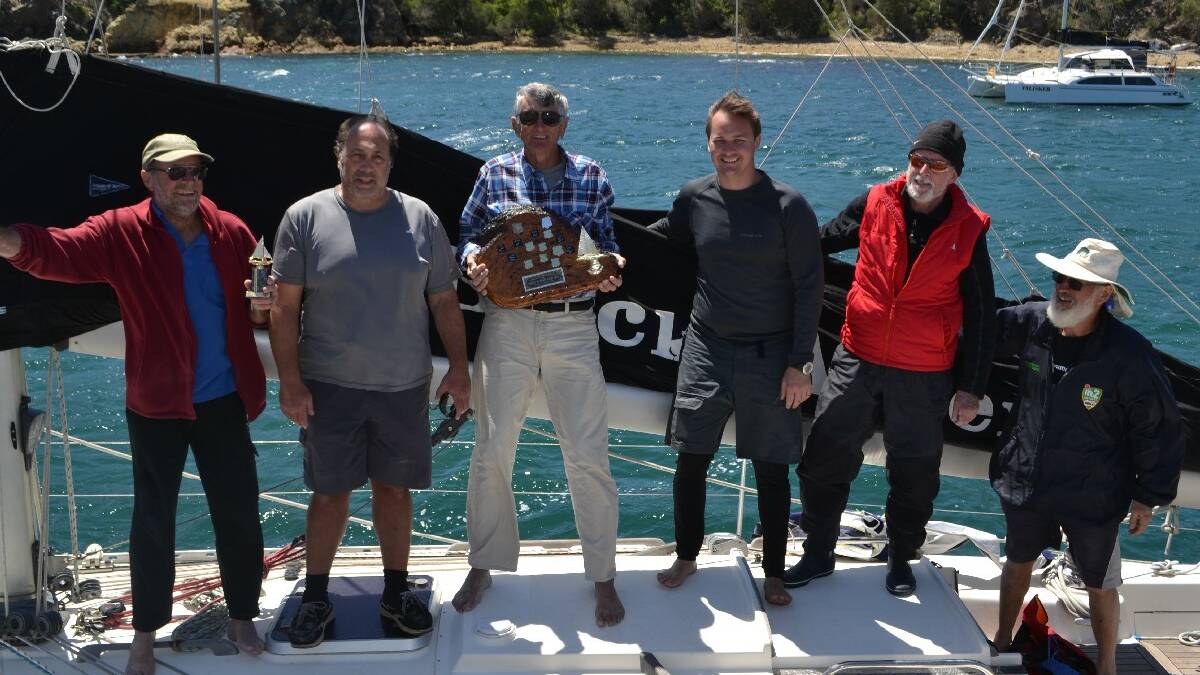 EDEN: The crew of Rolex Sydney Hobart retiree Black Adder were thrilled to receive the trophy for the first boat to retire into Eden. Owner/skipper Jim Clayton said; "That's the best anticlimax I've ever had!"
