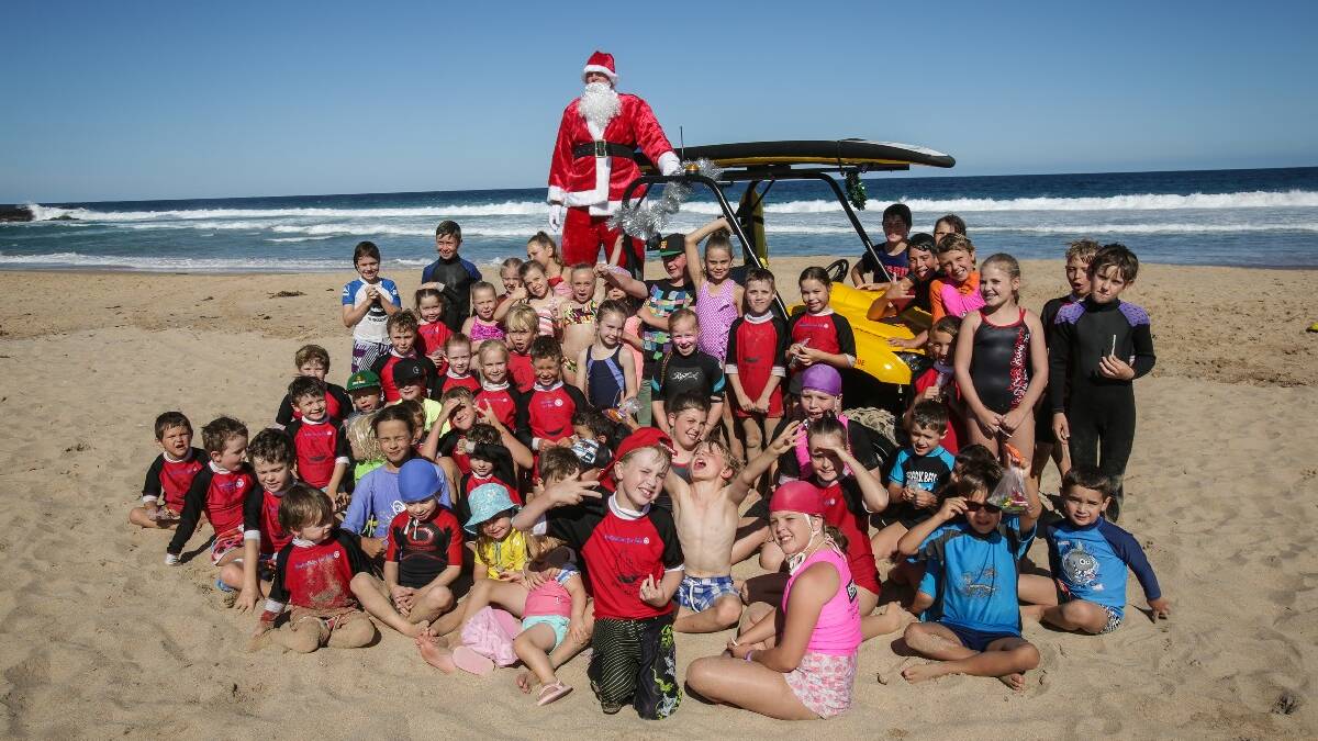 KIAMA: Kiama Downs Nippers enjoyed a visit   from Santa Claus at Jones Beach on   Saturday.